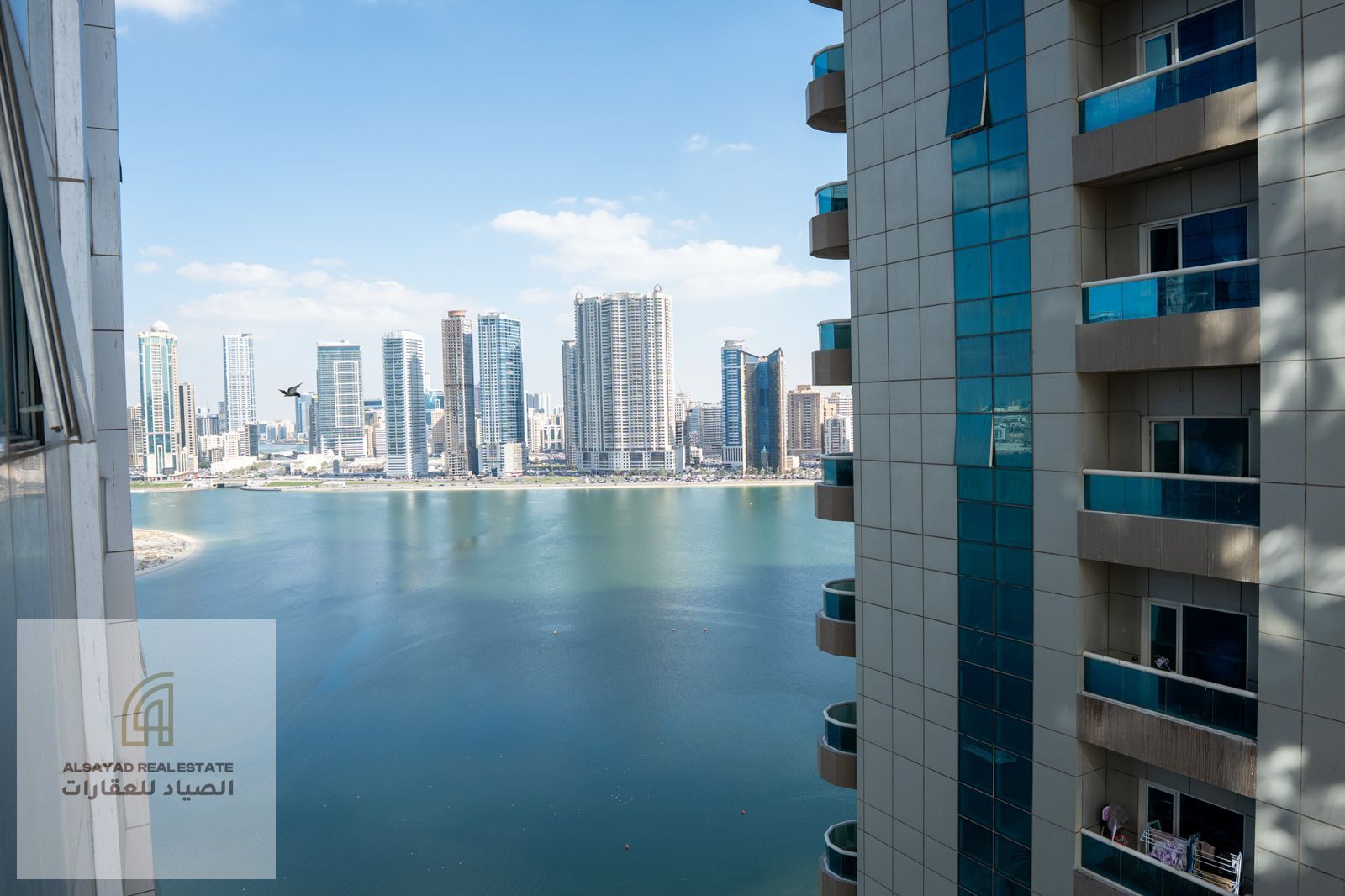 Two-bedroom apartment with a living room overlooking Al Mamzar beach