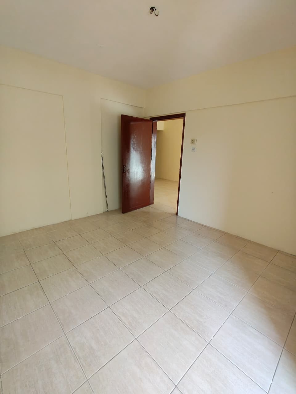 One bedroom and living room with a balcony
