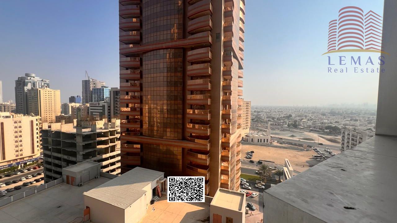 Two-bedroom apartment with a living room and a city view in Ajman