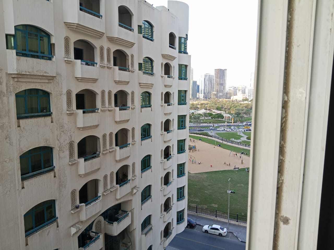 For annual rent in Sharjah, specifically in Al Majaz 2 area: two bedrooms, a living room, two bathrooms, central air conditioning, and an excellent si