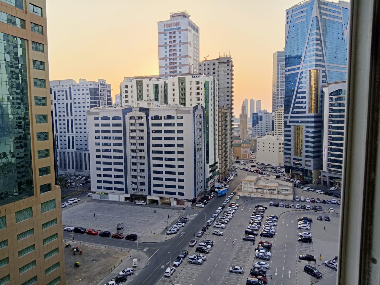 For annual rent in Sharjah, specifically in Al Majaz 2 area: two bedrooms, a living room, two bathrooms, central air conditioning, and an excellent si