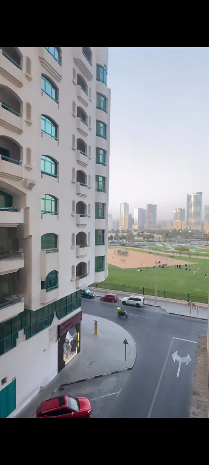 For annual rent in Sharjah, specifically in Al Majaz 2 area: two bedrooms, a living room, two bathrooms, a balcony, and central air conditioning. Exce
