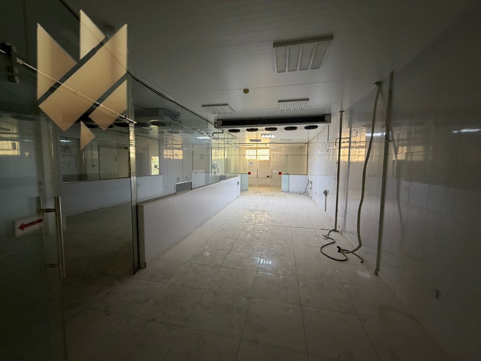 Two-story warehouse | Offices | Elevator | Bathrooms | Kitchen | Reception**