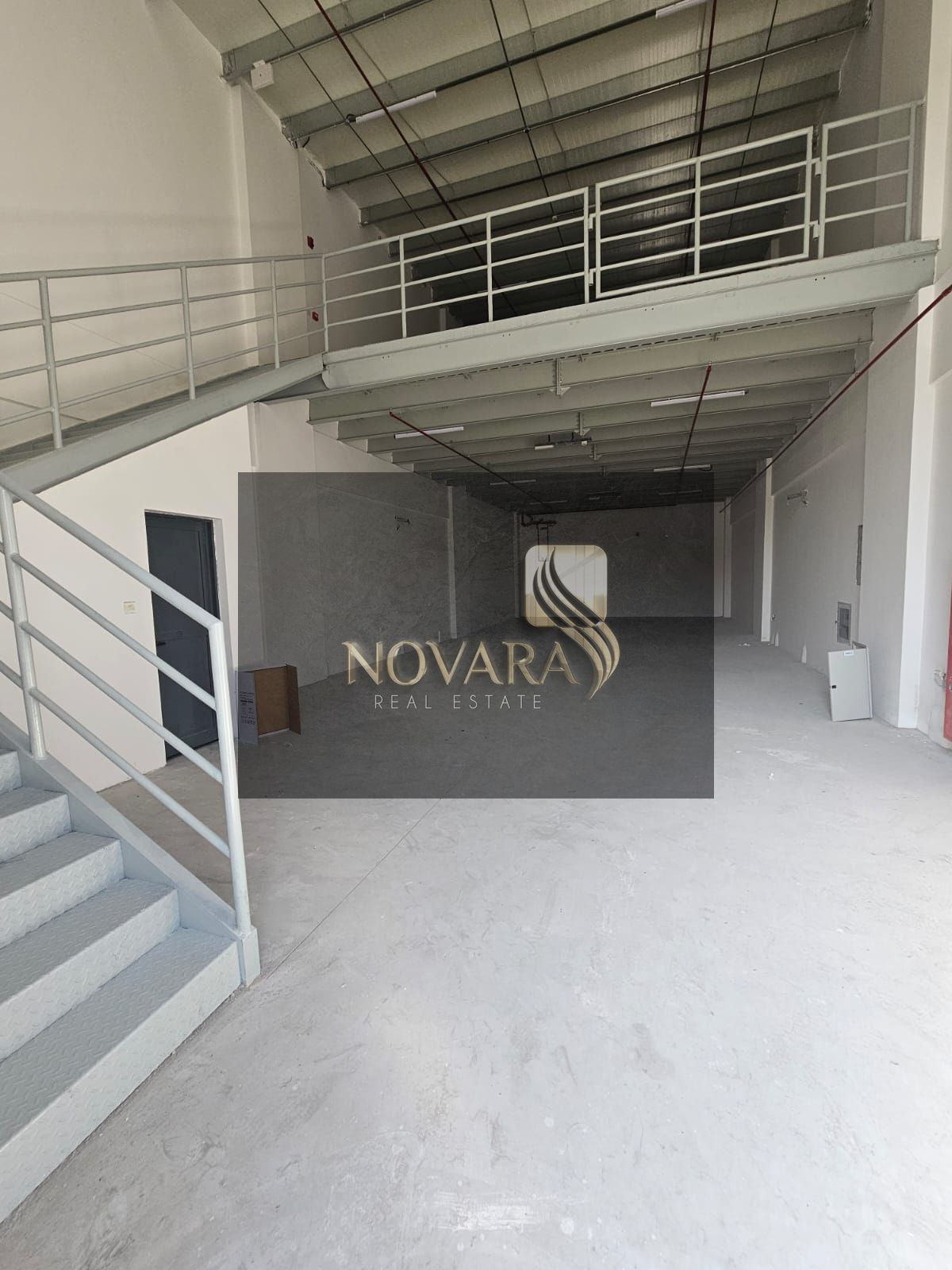 New warehouse for rent in Al Jurf Industrial 3 Ajman, 3,000 sq ft with mezzanine, 25–30 kW power, AED 130,000