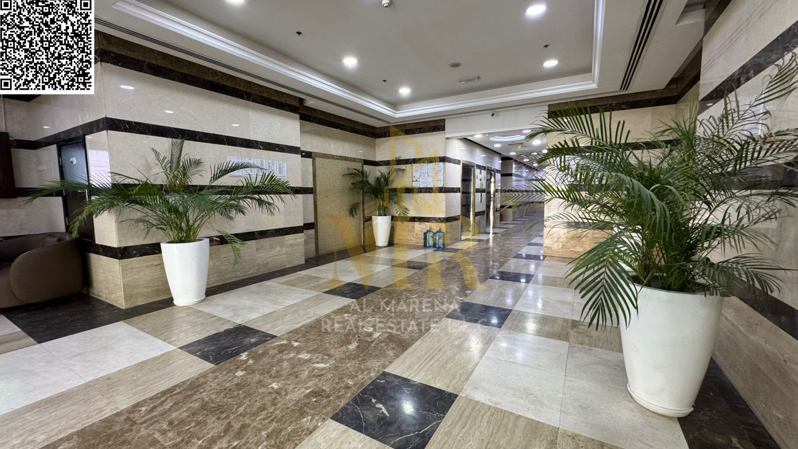 For sale: A distinctive apartment in Emirates City – Ajman | 71 square meters | One bedroom and living room with maid's room, open kitchen, balcony, a