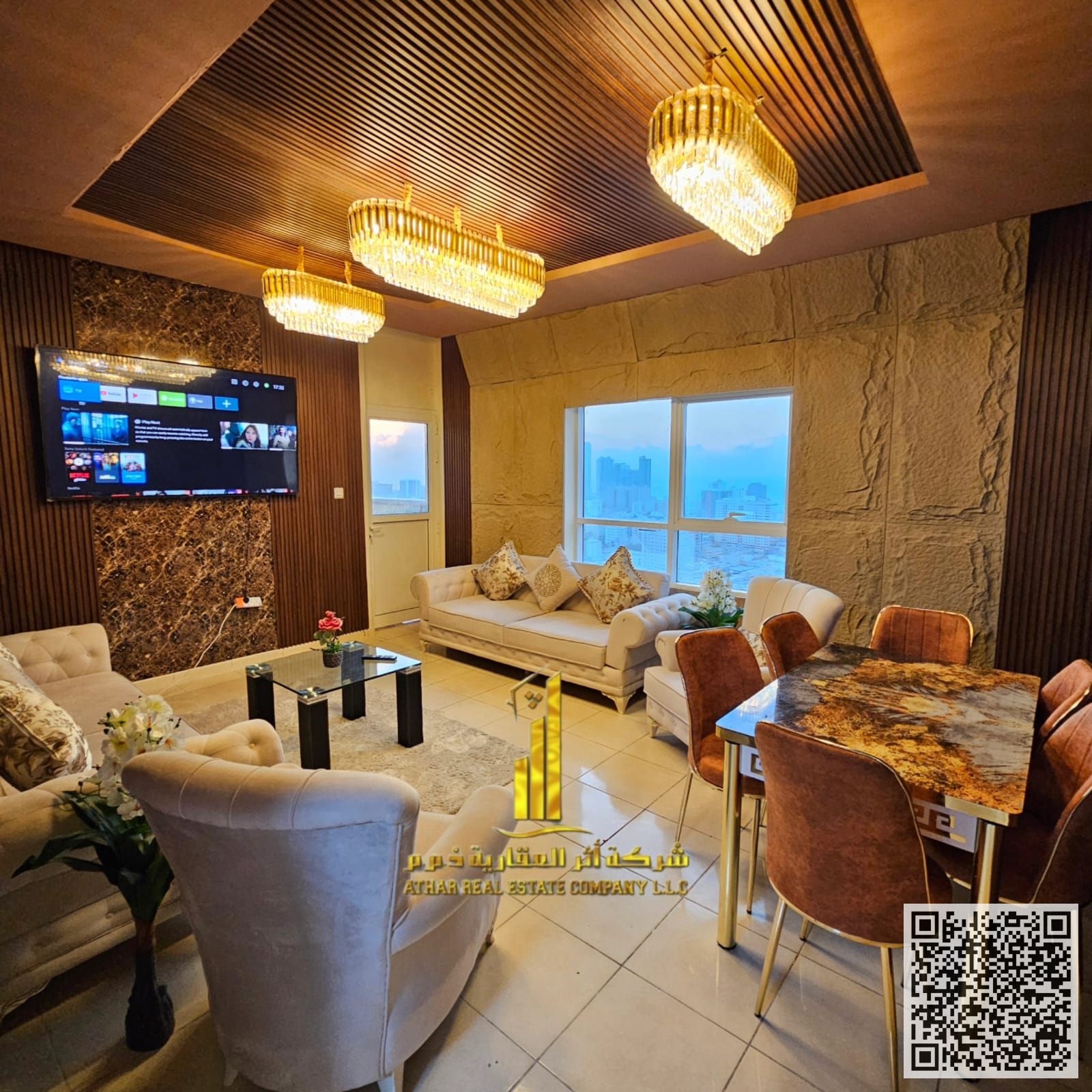 First occupancy, luxurious two-bedroom apartment with a fully furnished living room for monthly rent in Al Rashidiya 1, Orient Towers, with gym, swimm