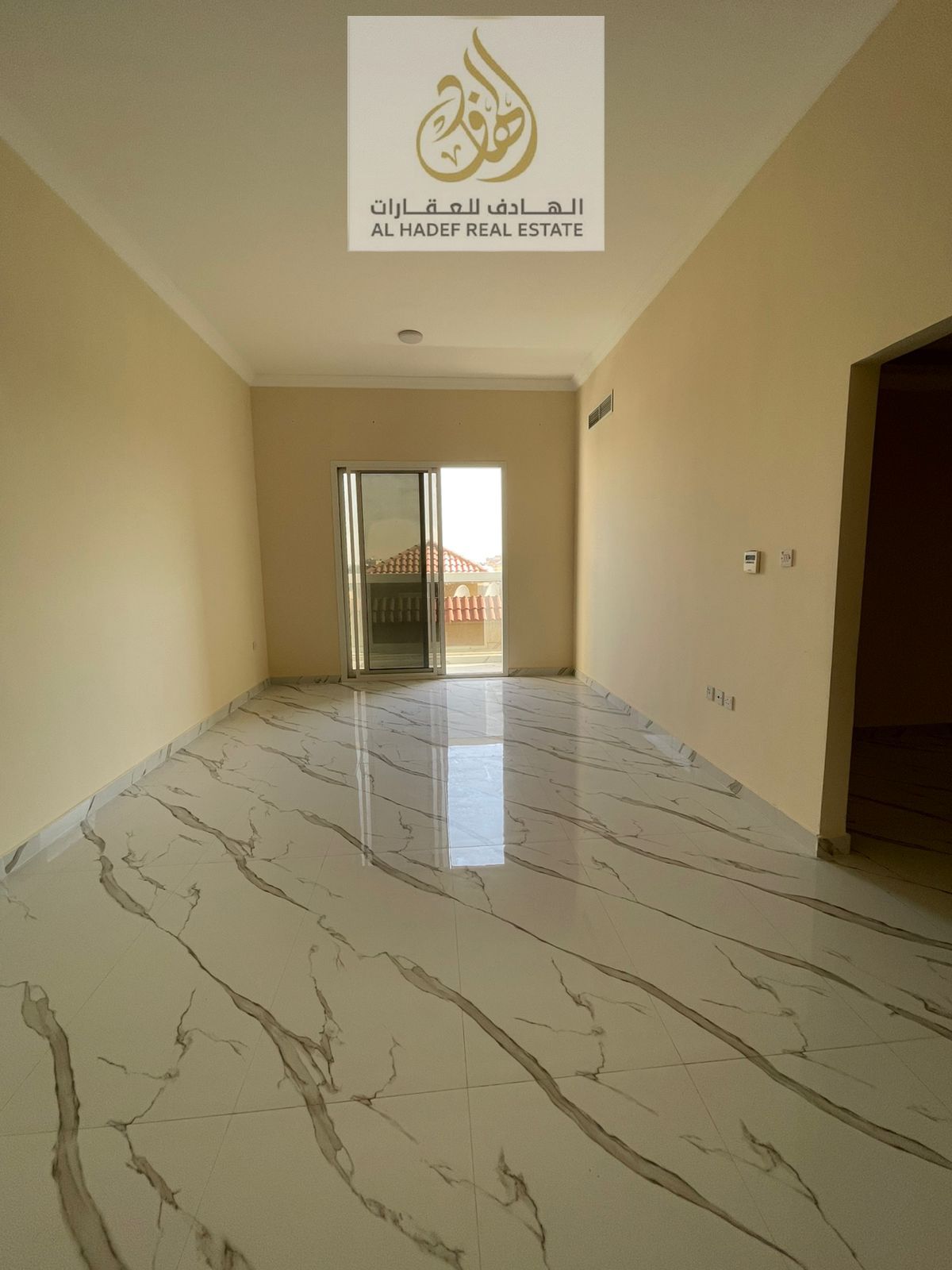 Annual rent in Ajman, Al Muwaihat 3 area, near Al Shuwaifat School and Ajman Academy. The building is for families and features two bedrooms, a living