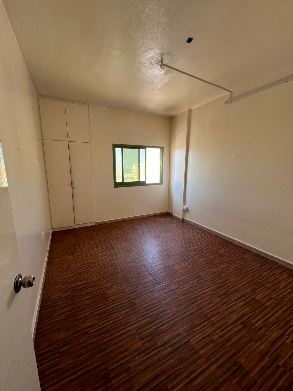 Two bedroom and a living room with a balcony , family occupancy only central air conditioning