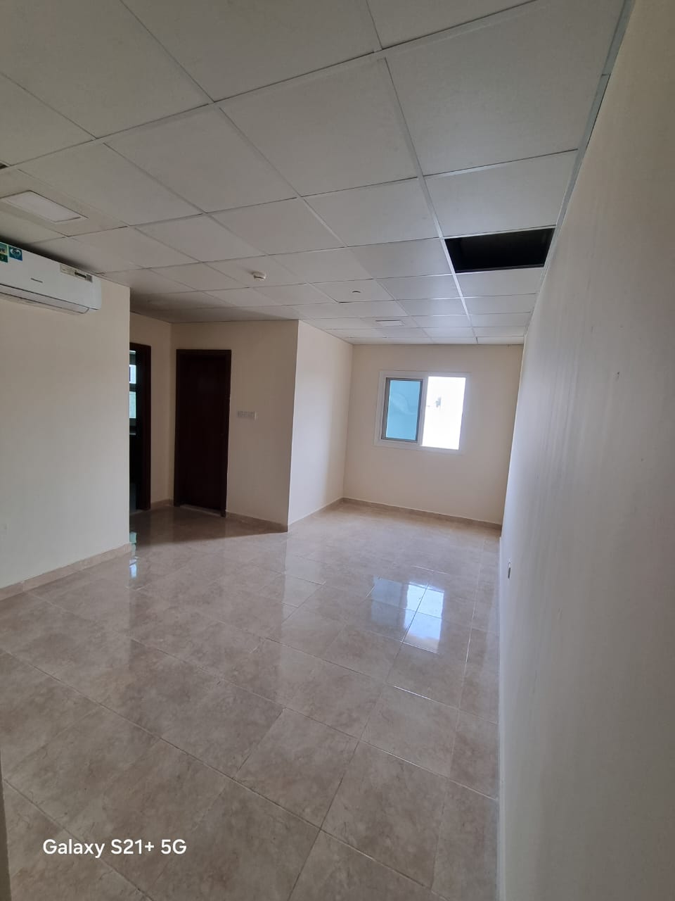 For annual rent in Sharjah, specifically in the Maysaloon area: a one-bedroom apartment with a living room, central air conditioning, and excellent si