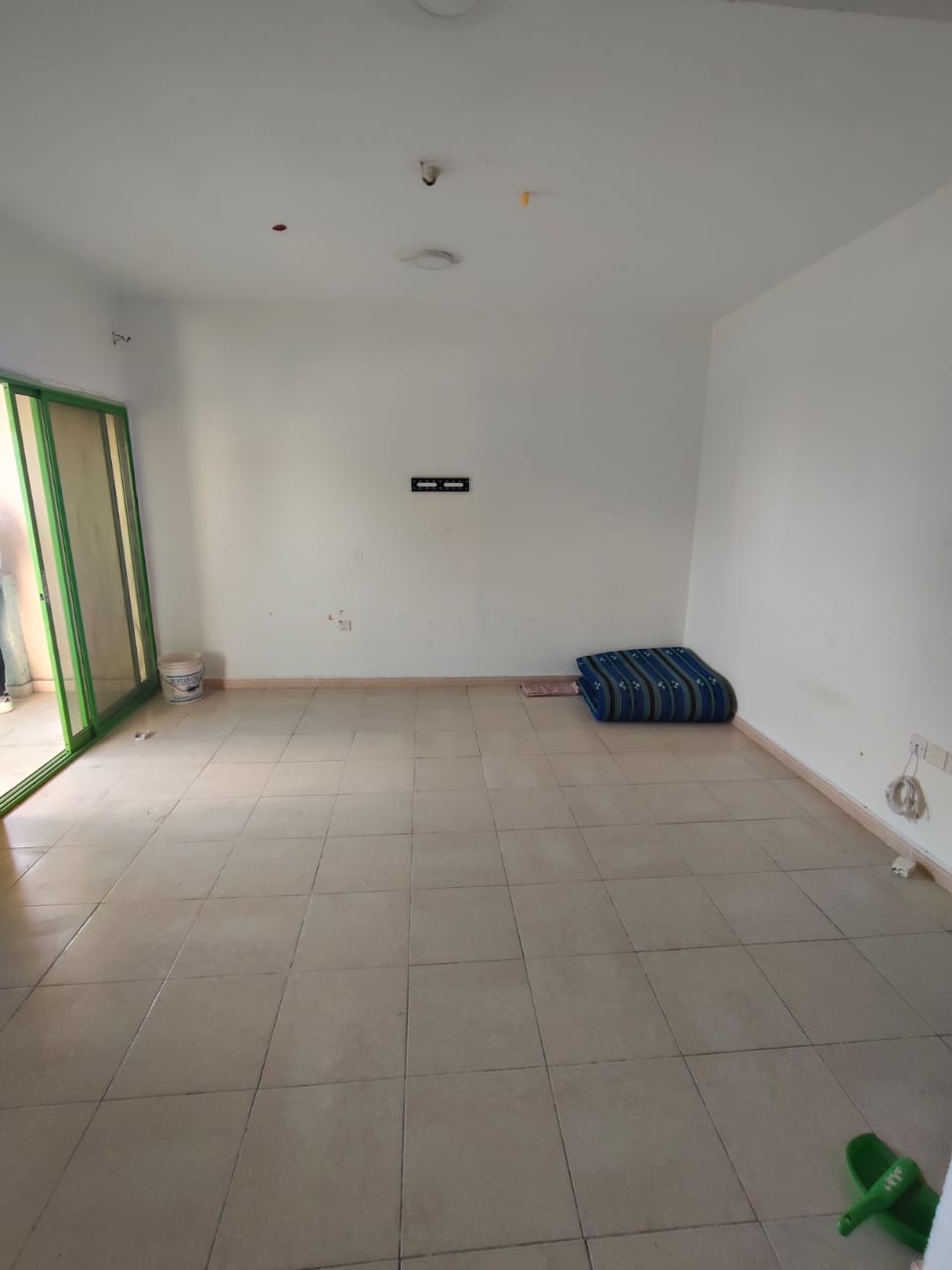 For annual rent in Sharjah, specifically in the Al Rolla area: two bedrooms, a living room, one bathroom, and two balconies, with an excellent size.