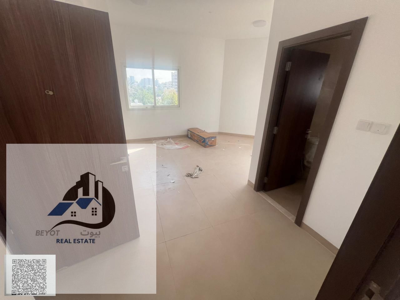 For annual rent in Ajman, a one-bedroom apartment with a living room, brand new, in Al Rashidiya 3.