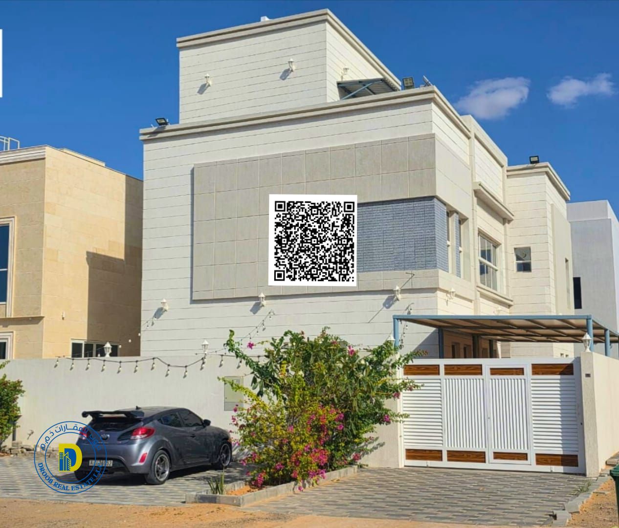 Luxury villa for sale in Al Yasmin area, 4000 sq ft, 5 bedrooms, majlis, 2 living rooms, and roof terrace. Includes air conditioning, water, and elect