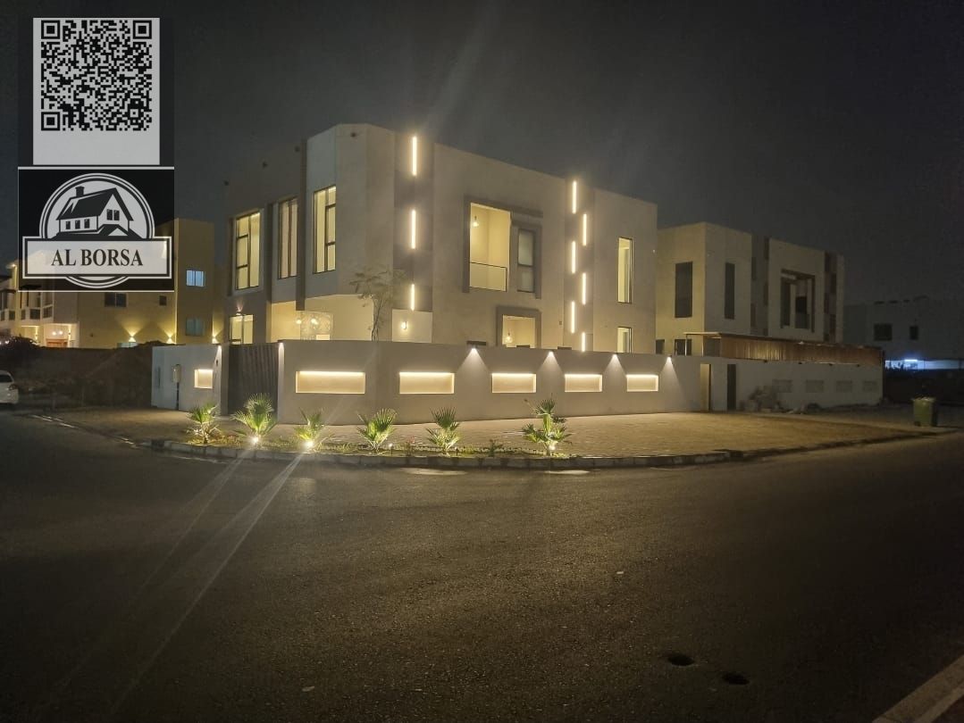 Corner villa for rent in Al Yasmeen area, Ajman: 5 master bedrooms, majlis, living room, and maid's room with a modern design and luxurious finishi
