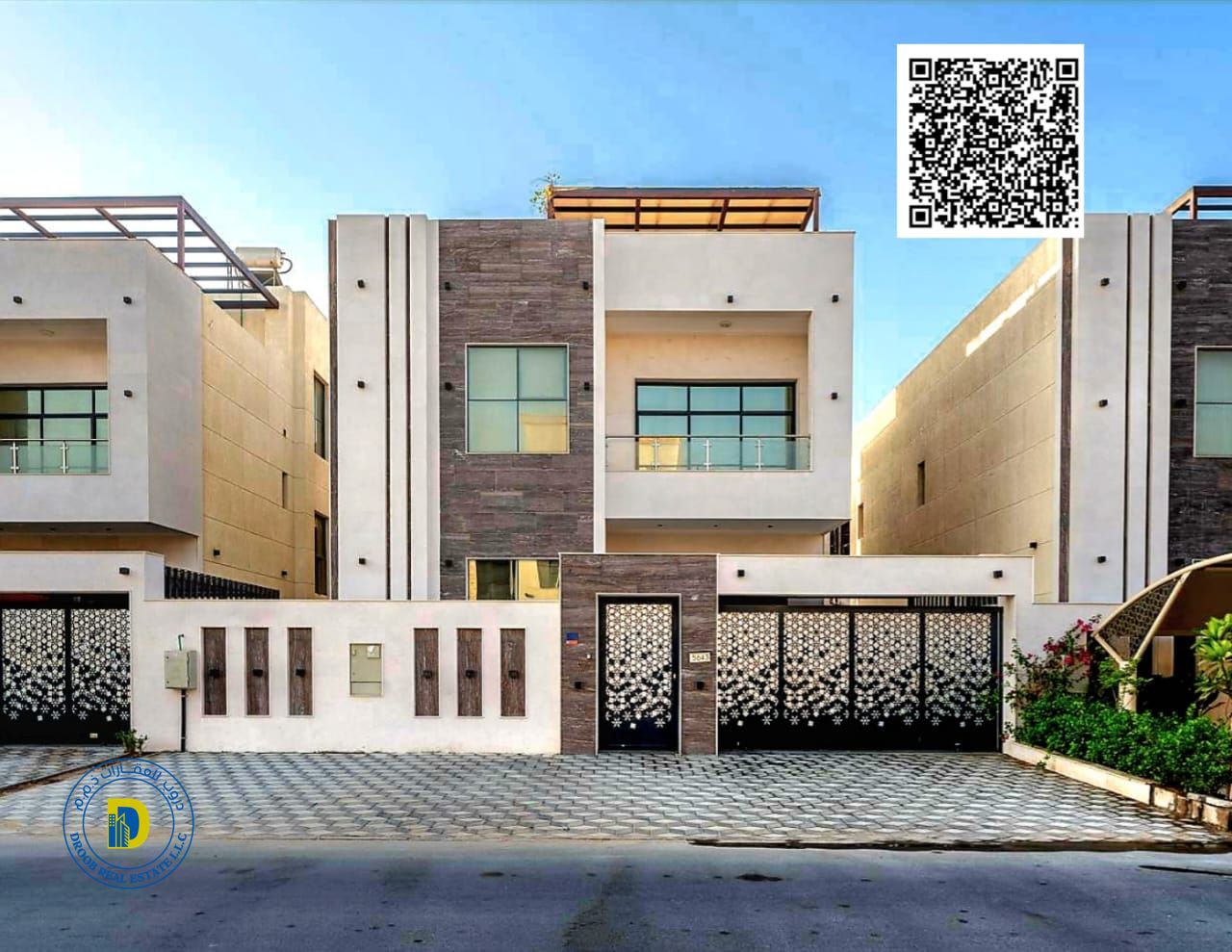 Luxury villa for sale in Al Yasmin area, 4000 sq ft, 5 bedrooms, majlis, living room, and roof terrace. Includes air conditioning, water, and electric