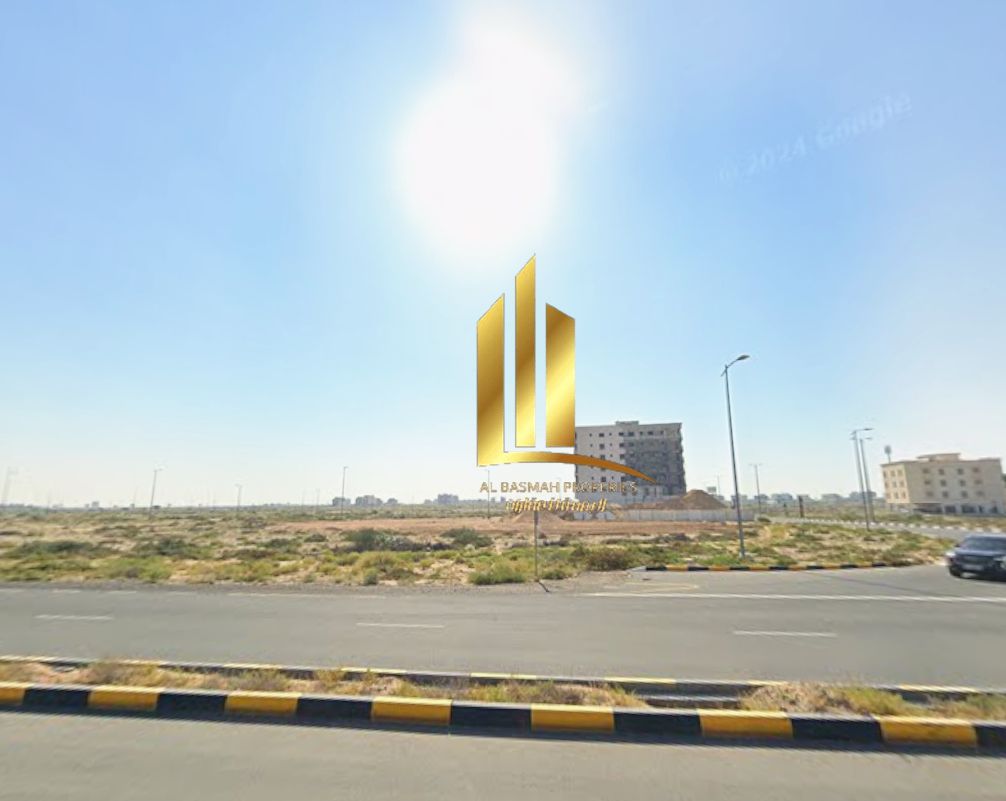 Commercial land for sale in Al Sharqah Hills