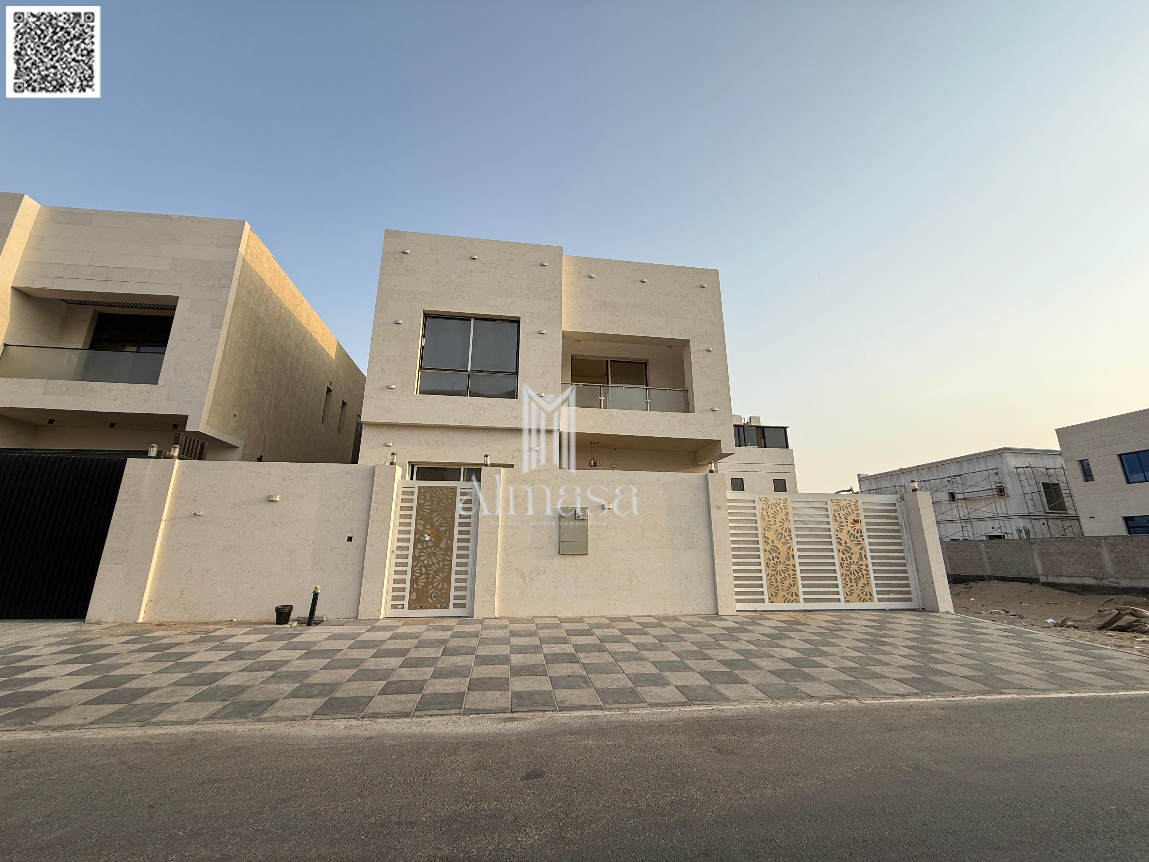 Villa for sale in Ajman, Al Yasmin area. 6 master bedrooms, living room, majlis, and maid's room. Freehold ownership for all nationalities.