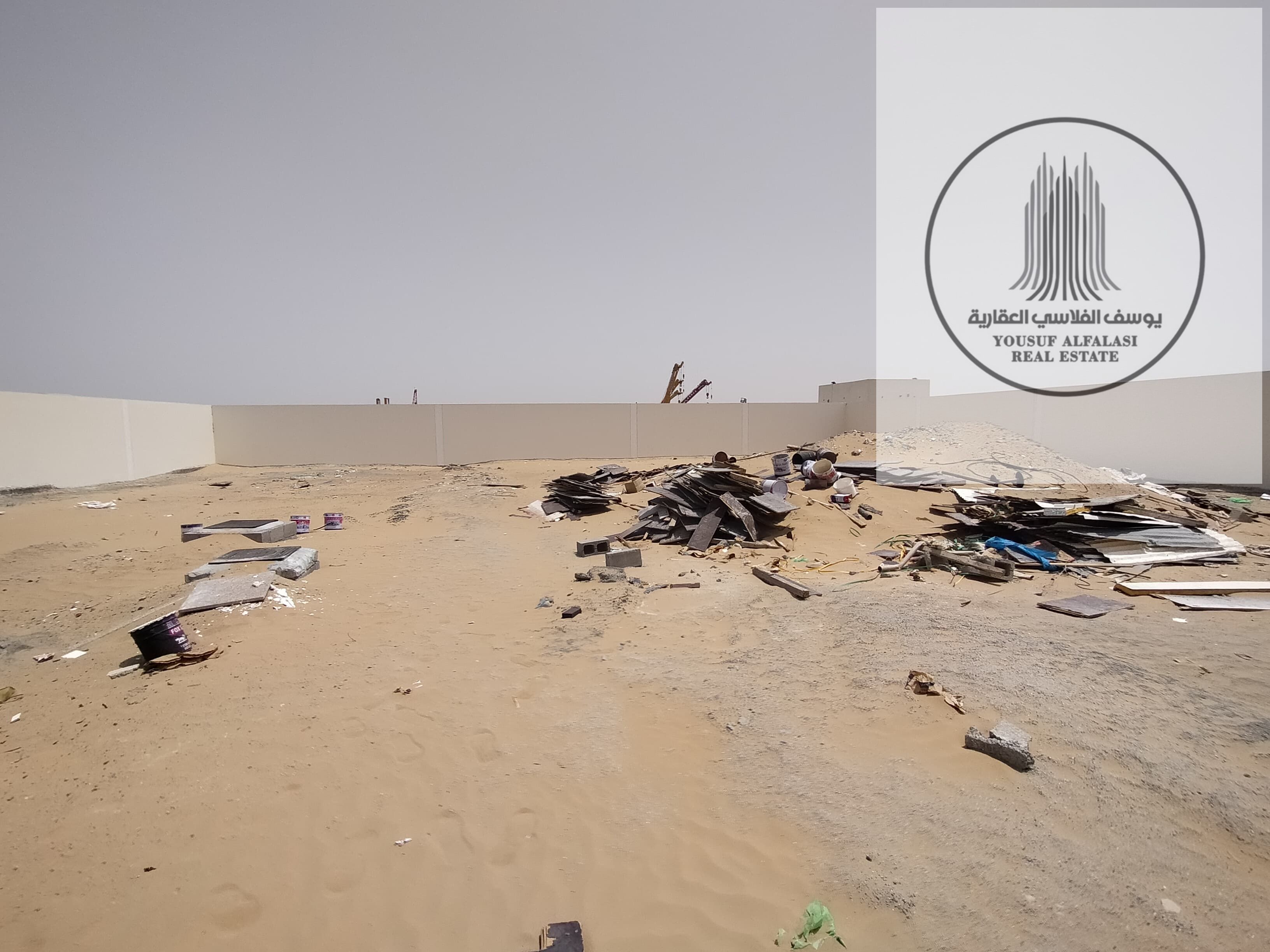 For rent 10,000 sq ft plot in Al Sajaa without electricity