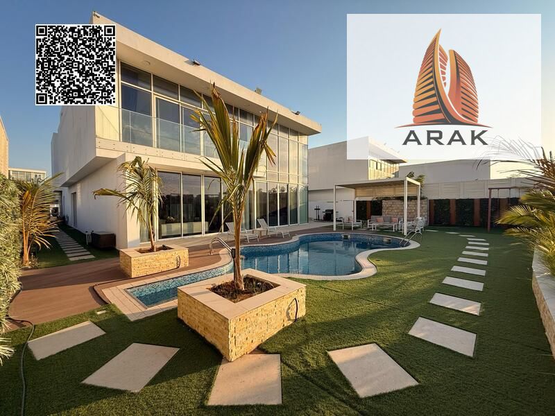 A luxurious villa for sale in Al Zorah Golf Community, Ajman, offering an upscale coastal living experience that combines luxury and tranquility in a
