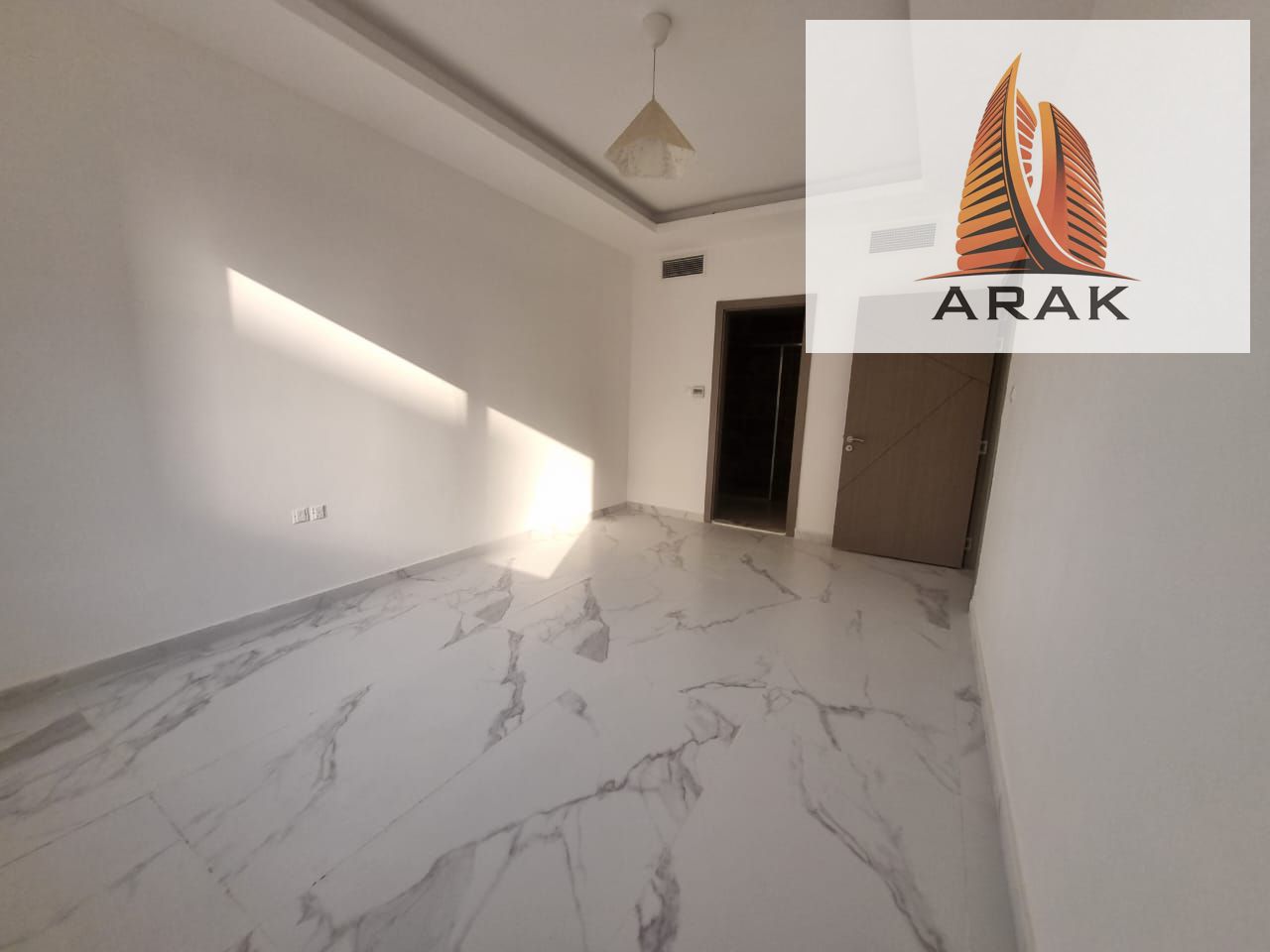 Annual rental – two-bedroom apartment with living room in Al Jurf 3