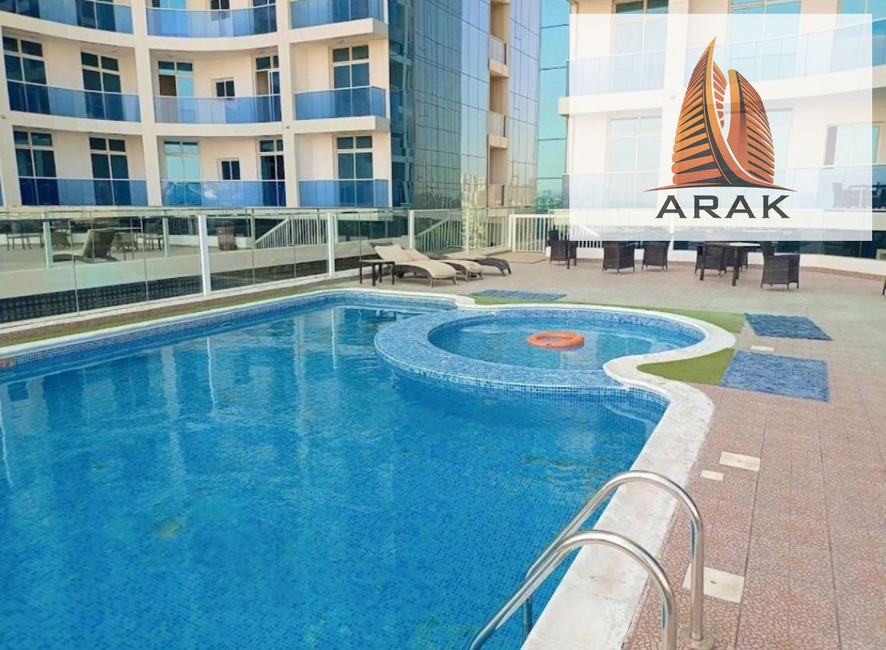 Annual rental: one-bedroom apartment with living room in Oasis Towers Includes gym, swimming pool, and parking Rent: 36,000 AED payable in 4 installme