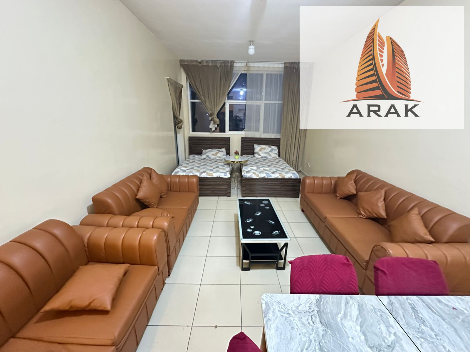 Two-bedroom apartment with a living room for sale in installments in Ajman One, Al Rashidiya 3, Ajman, close to all services.