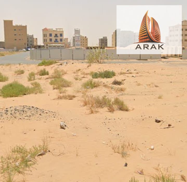 For sale in Al Amrah area, Ajman: two residential/commercial plots of land with permits for ground floor + 6 floors, close to all services.