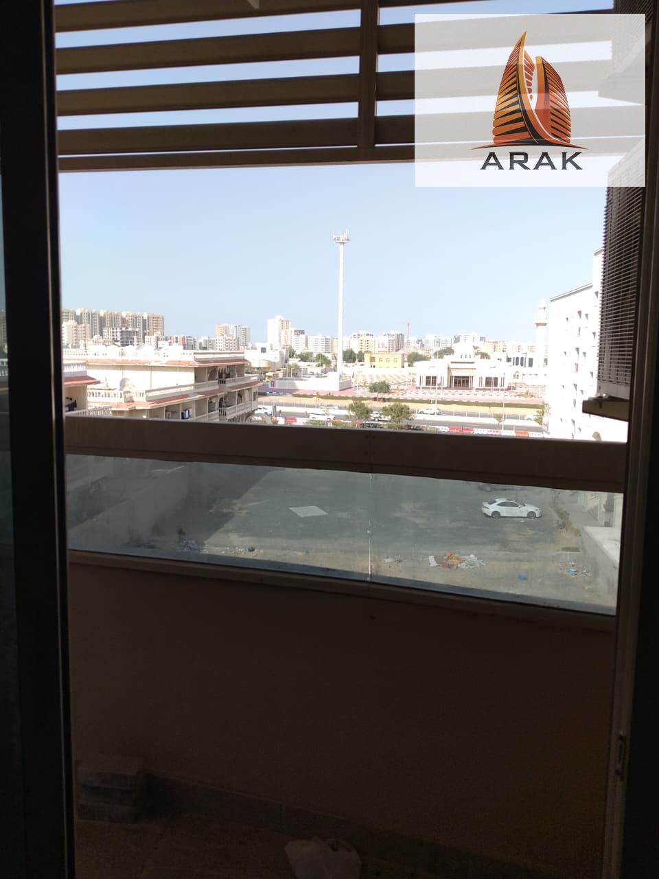Two-bedroom apartment with a living room in Al Rawda 2, Ajman, with three bathrooms, close to all services.
