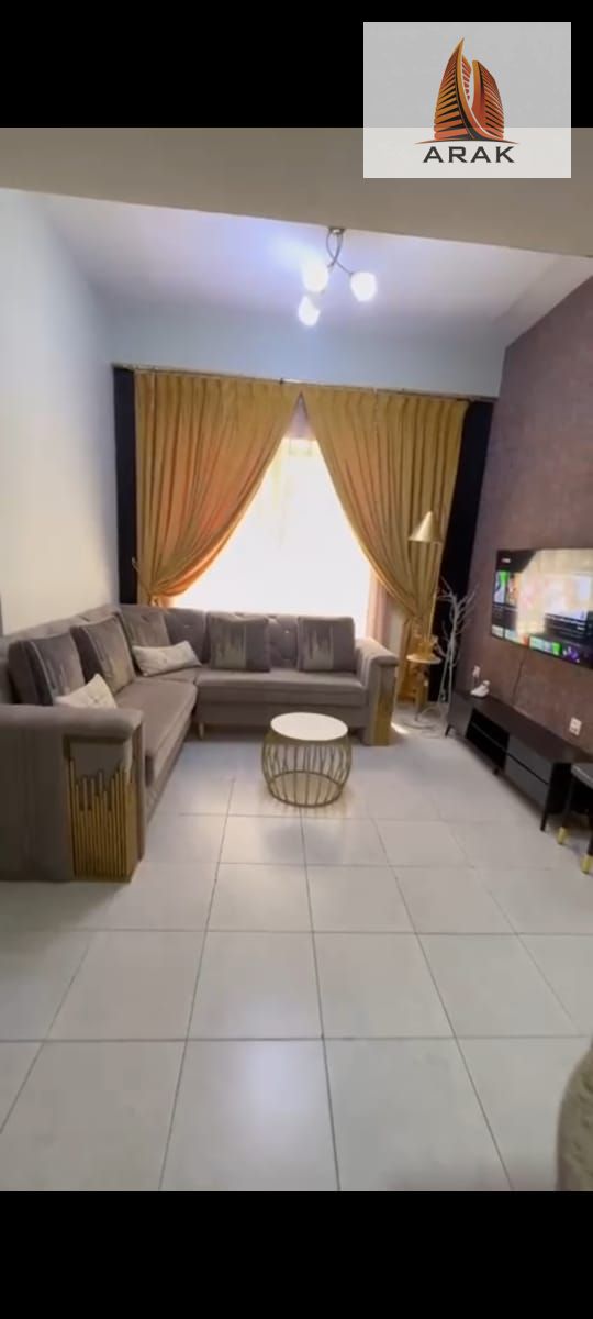 For sale: a prime one-bedroom apartment with a living room in Garden City Towers, Al Hamidiya, Ajman,