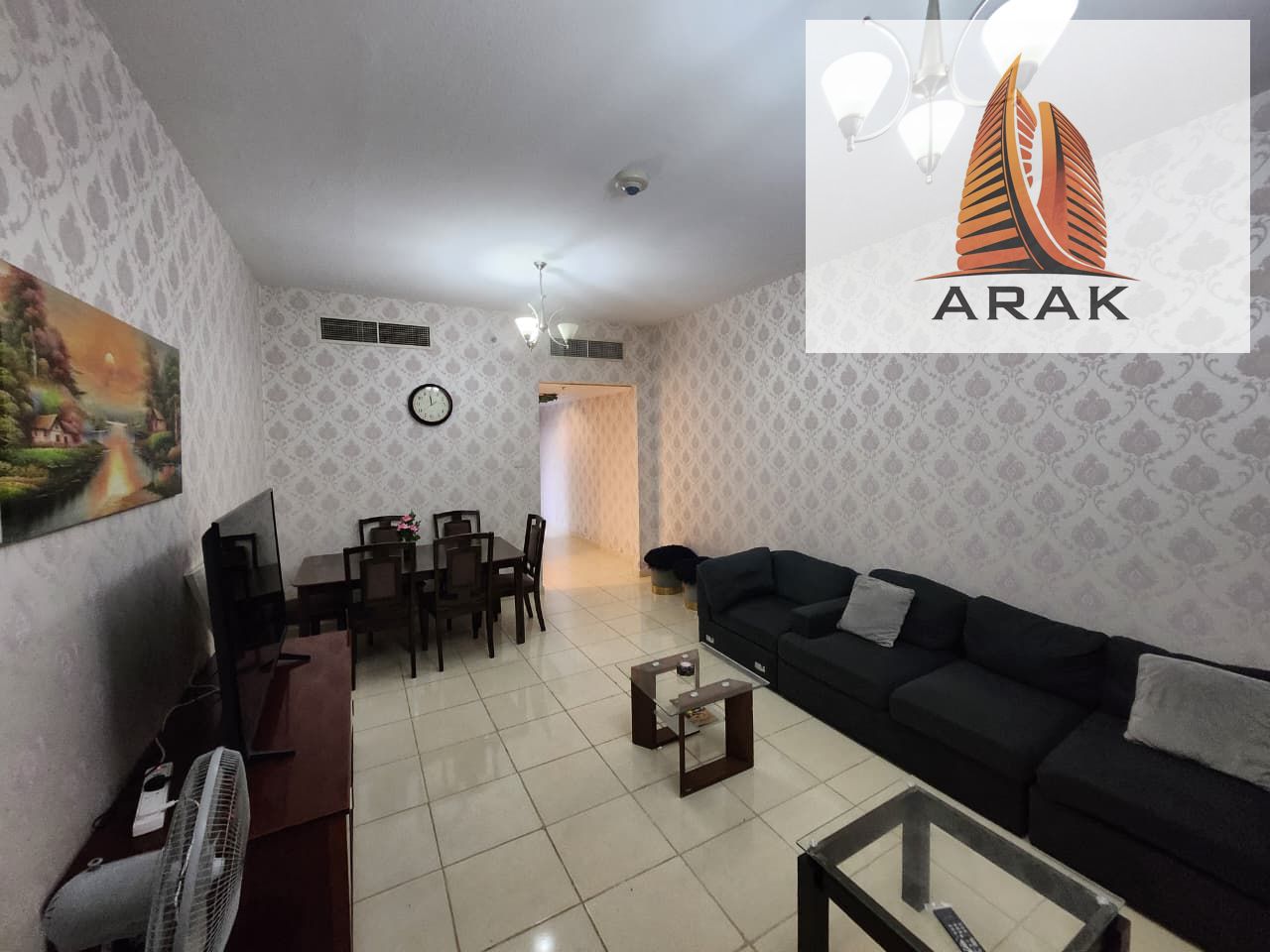 One-bedroom apartment with a living room in Orient Towers.