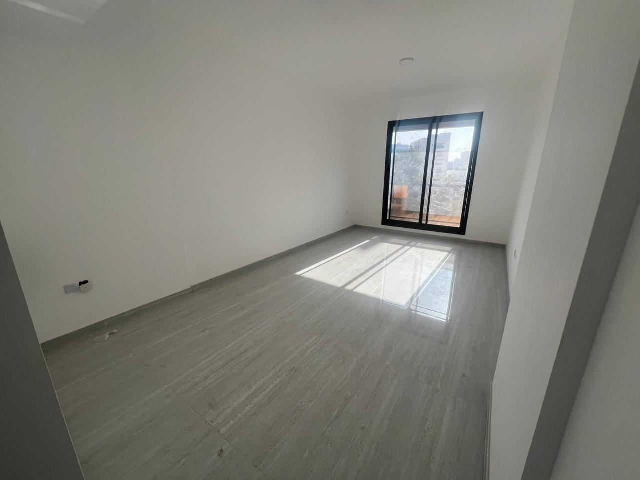Brand new building, first occupancy. For annual rent in Ajman. Two-bedroom apartment with a living room in Al Rashidiya 3. Opposite Ladies Park.