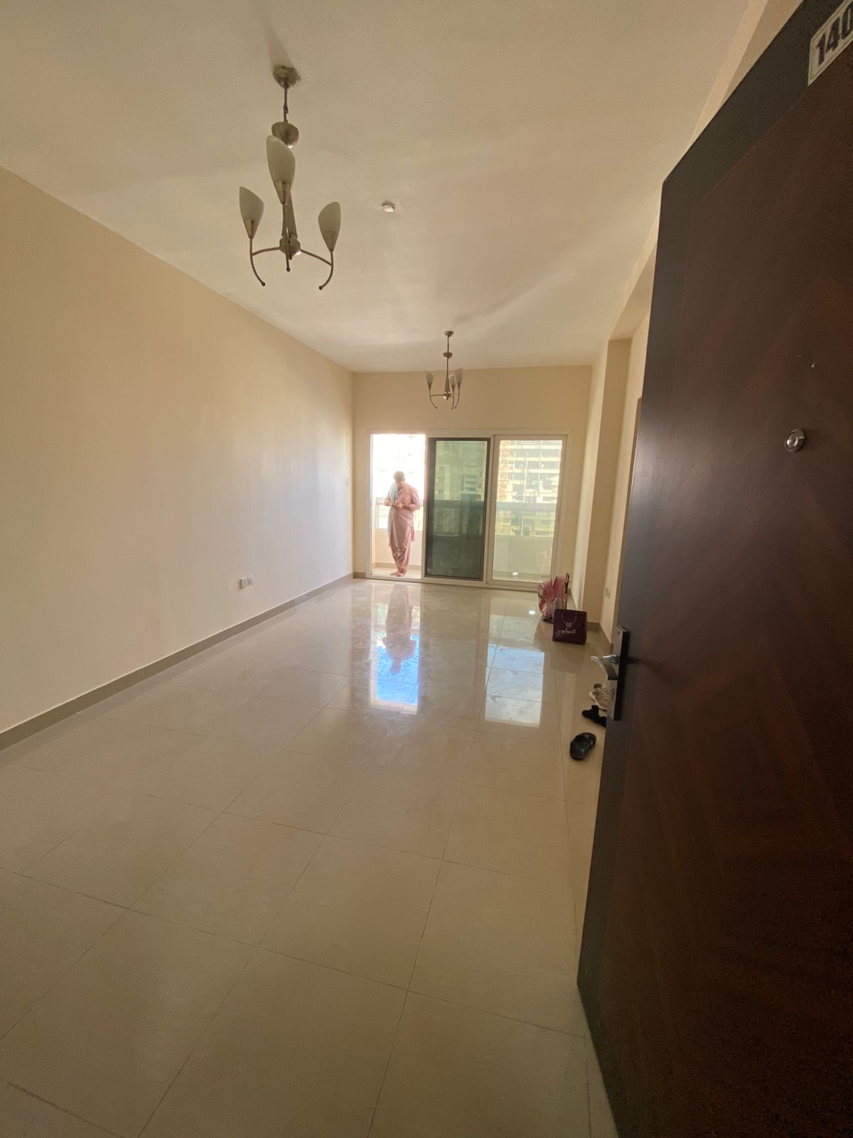 For annual rent in Sharjah, specifically in the Al Taawun area: one bedroom and a living room with excellent space, a balcony, and central air conditi