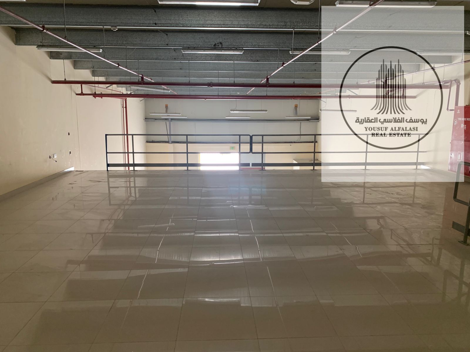Warehouse for rent in Industrial Area 18, 3,300 sq ft, mezzanine, price AED 160,000, electricity 13 kW, office and bathroom