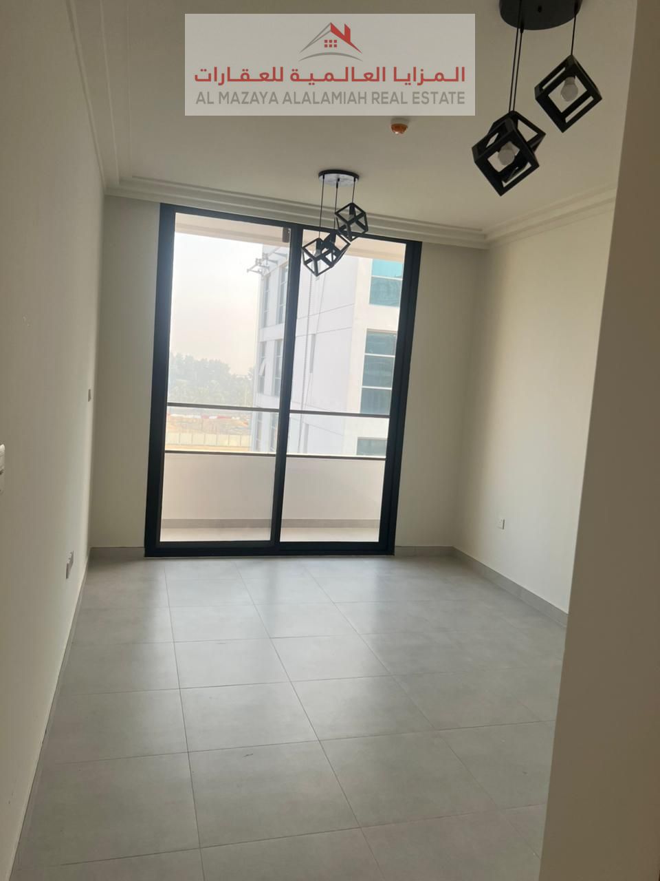 For annual rent: Brand new deluxe apartment in a first-time-occupied building. One bedroom, living room, two bathrooms, and balcony.