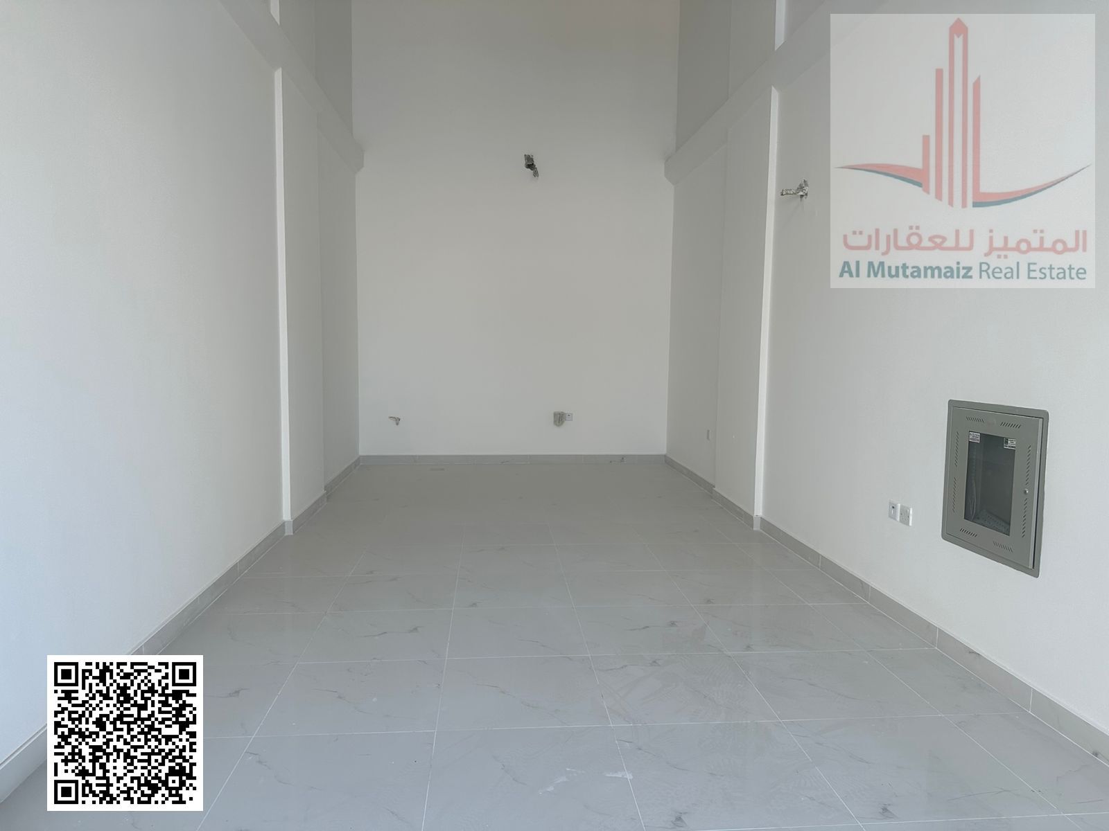 Shop for Rent in Al Jurf Industrial Area Modern Building Large Area Excellent Finishing Prime Location Suitable for All Commercial Activities