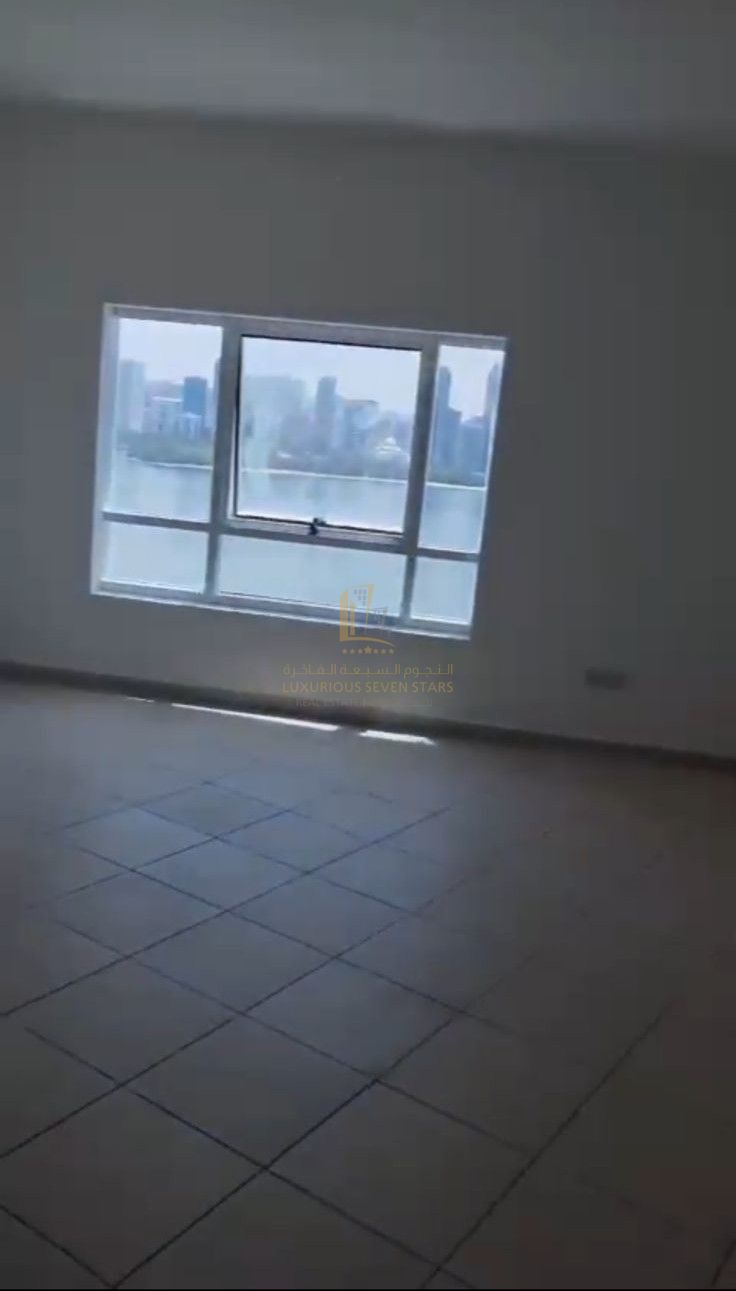 For Sale Spacious Apartment in Sara Tower – Al Majaz 3 with Stunning Panoramic Lake View
