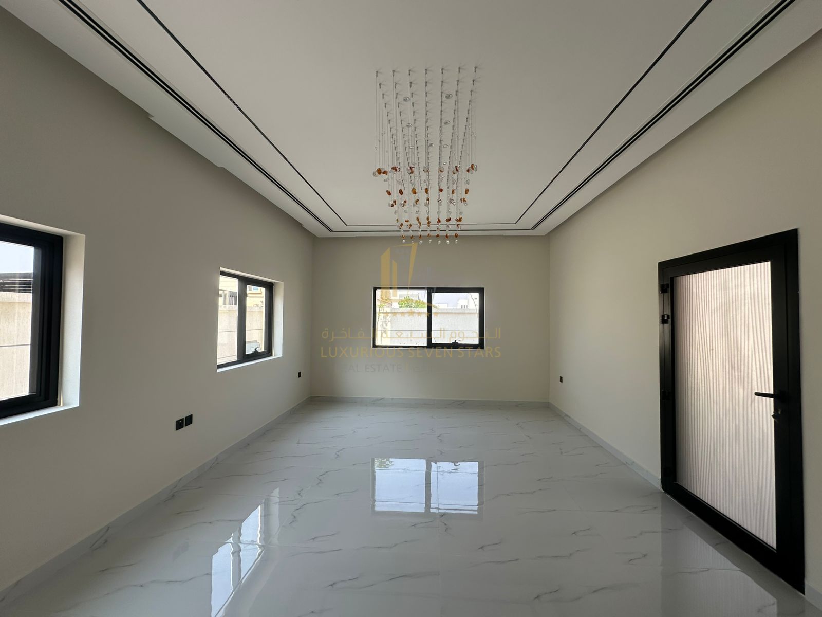 For sale first-inhabitant villa in Al-Hoshi with luxurious finishes and a prime location.
