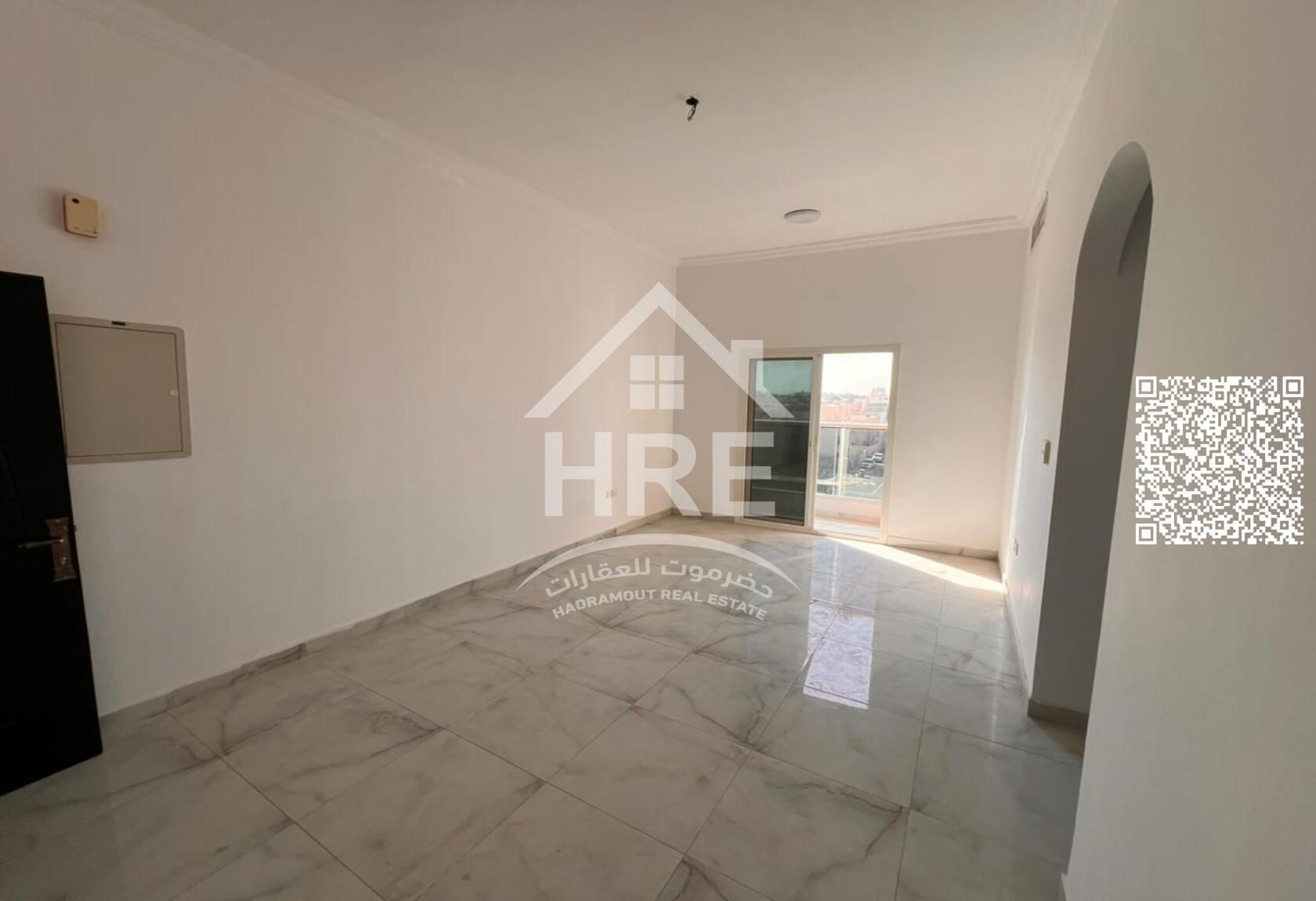 Two-bedroom apartment with a spacious living room for rent in Al Rawda