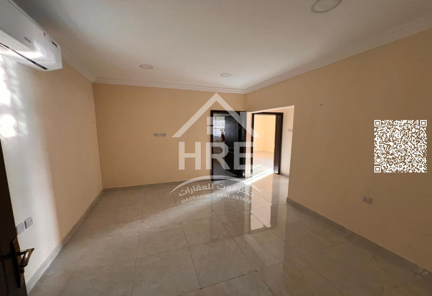 Two-bedroom apartment with a spacious living room for rent in Al Rawda