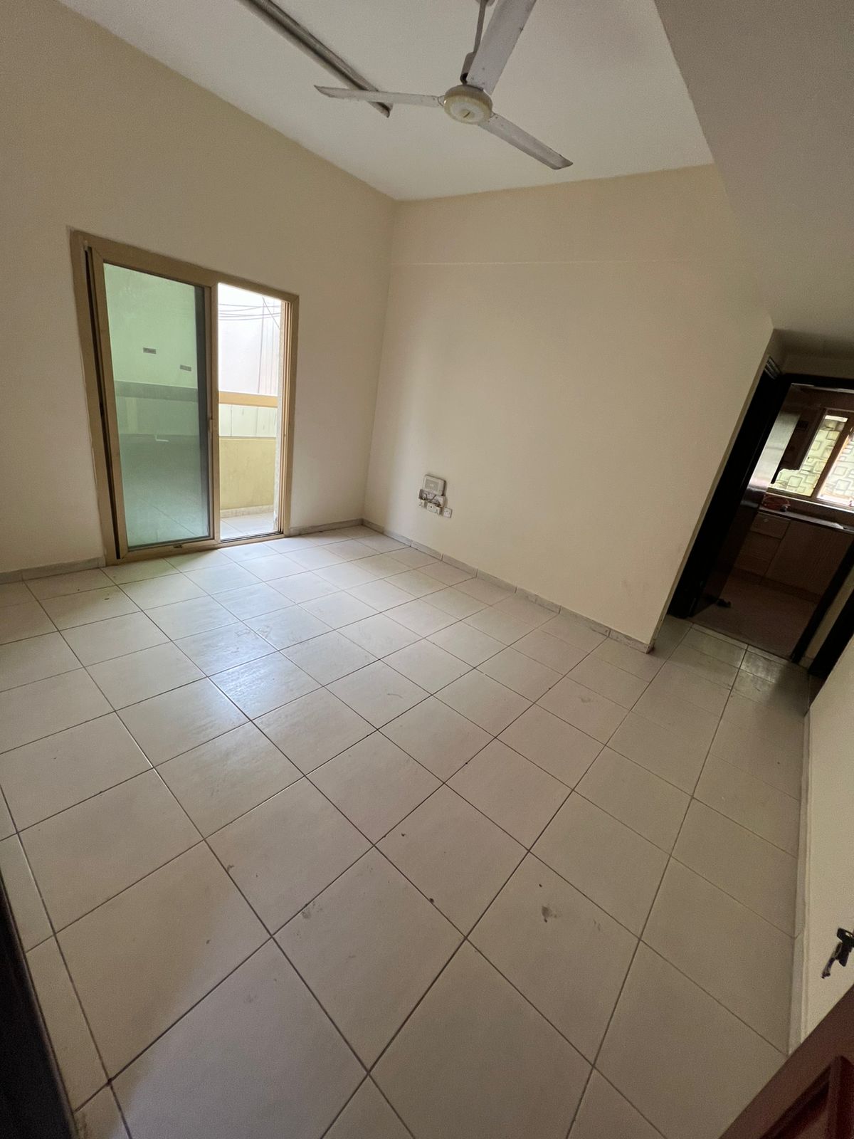 Bedroom and living room in Al Naba’ah, family only, balcony, central AC and gas, rent AED 25,000, 4 cheques.