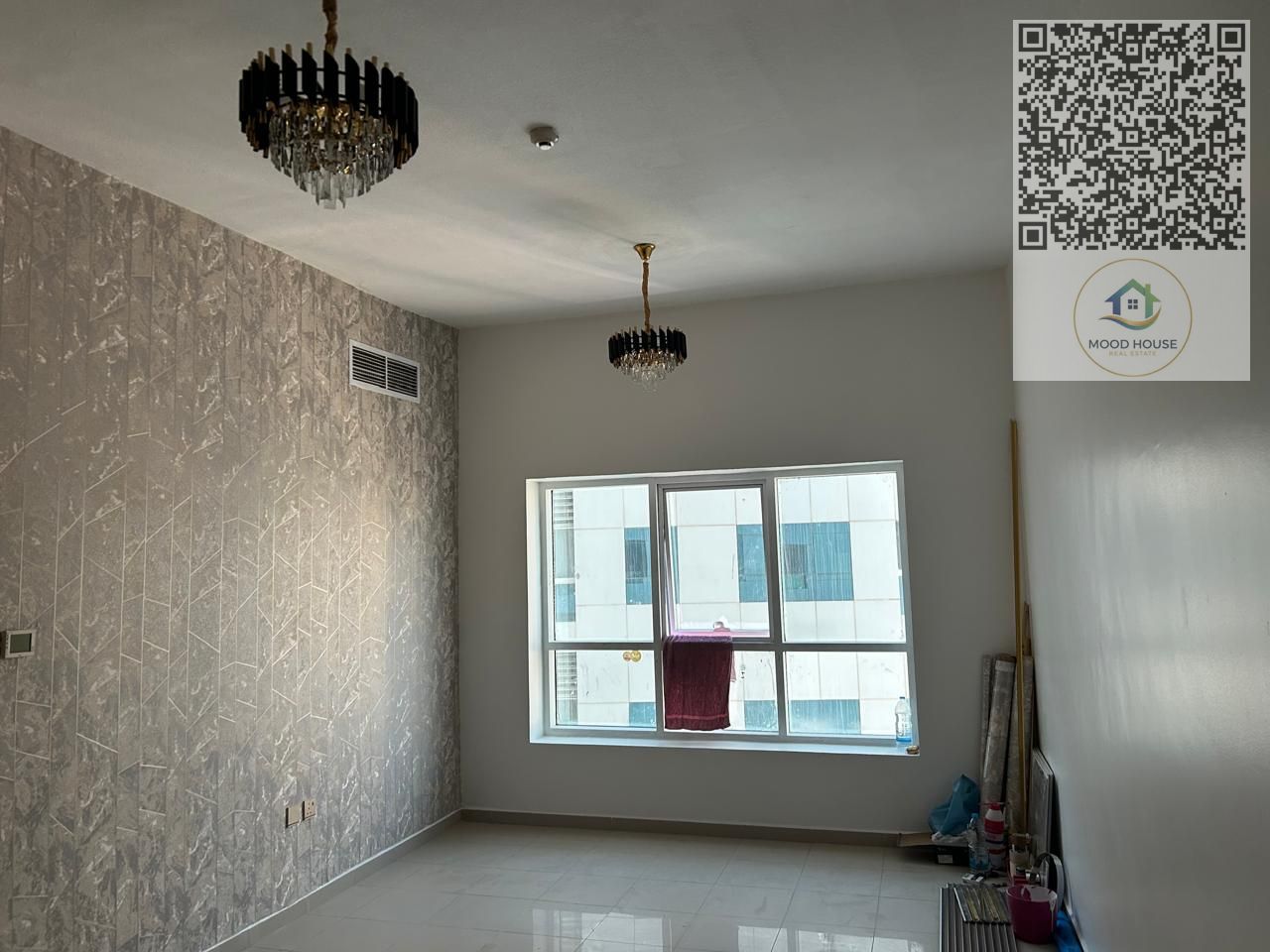 One-bedroom apartment for SALE in Pearl Towers, Ajman. Spacious layout, open-view balcony, two bathrooms, new finishing, clean building, parking avail