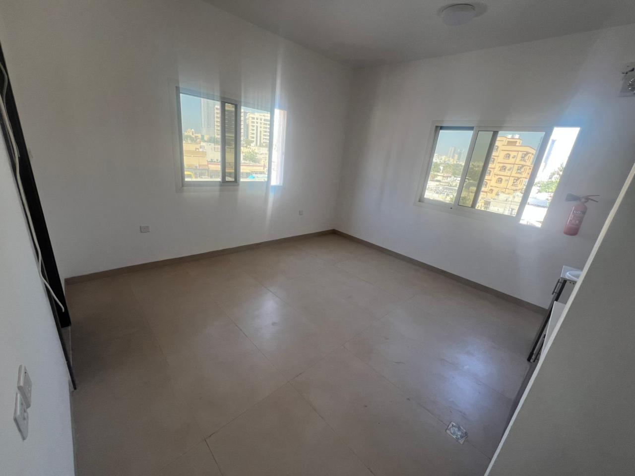 Brand new building, first occupancy For annual rent in Ajman Studio apartment, first occupancy Al Rashidiya 3 area