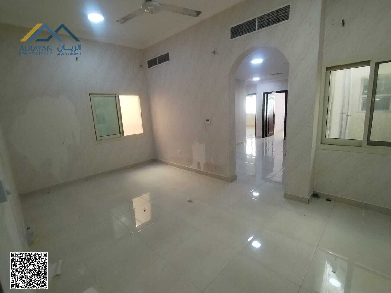 Two-bedroom apartment with a living room and three bathrooms for rent in Al Rawda 3, near Sheikh Ammar Street.