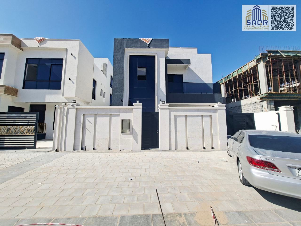 Deluxe villa for sale in Al Helio 2, Ajman. Includes registration and ownership fees. 6 master bedrooms, central air conditioning, freehold ownership