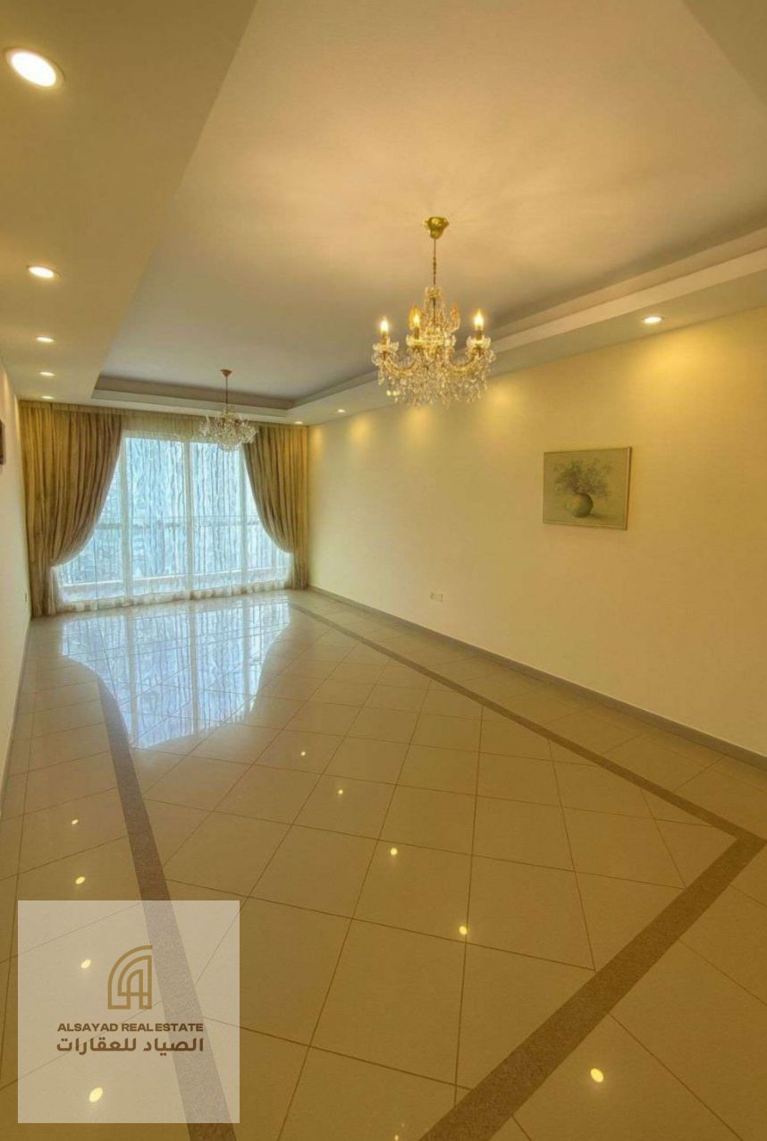 For sale: a luxury two-bedroom apartment with a living room in a prime location.