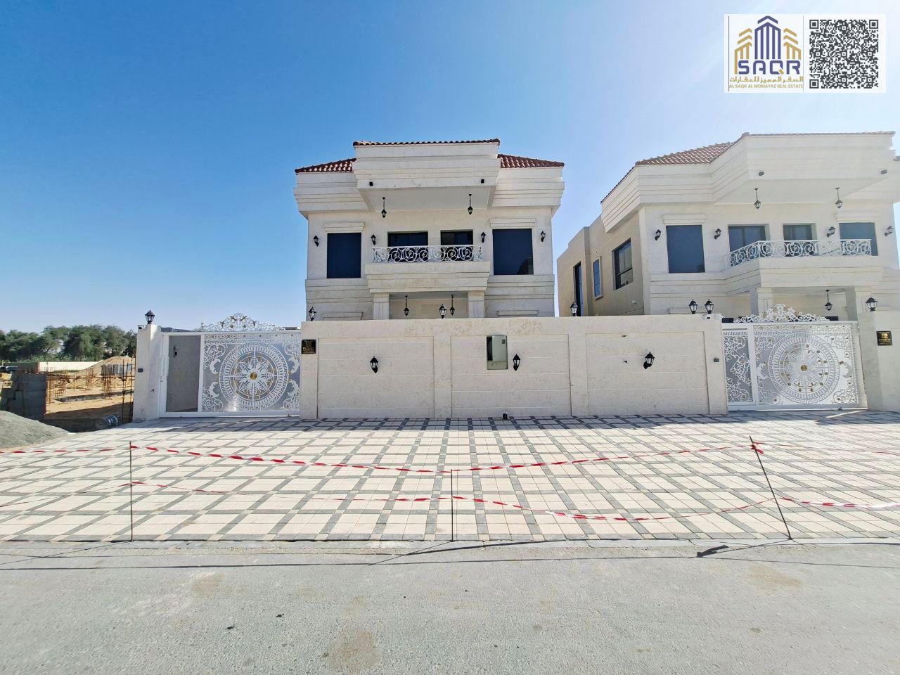 Classic villa for sale in Al Helio 2, Ajman. Includes registration and ownership fees. 4 master bedrooms, central air conditioning, freehold ownership