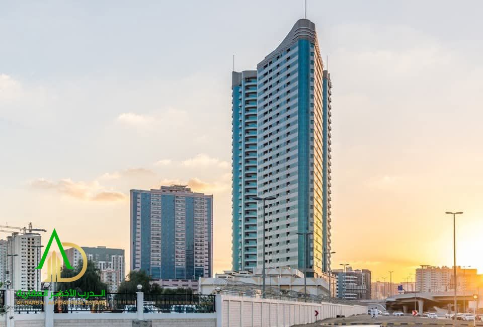 apartment in a modern residential tower featuring an elegant contemporary architectural design that combines luxury and comfort in the heart of Ajman.
