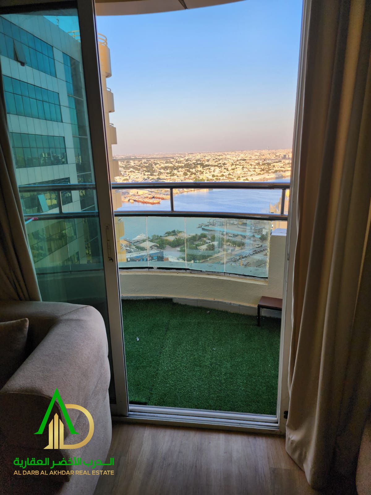 Own a luxury 2-bedroom apartment with a direct creek view – Horizon Towers, Al Rashidiya 1 Featuring outdoor spaces, a waterfront promenade, and dedic
