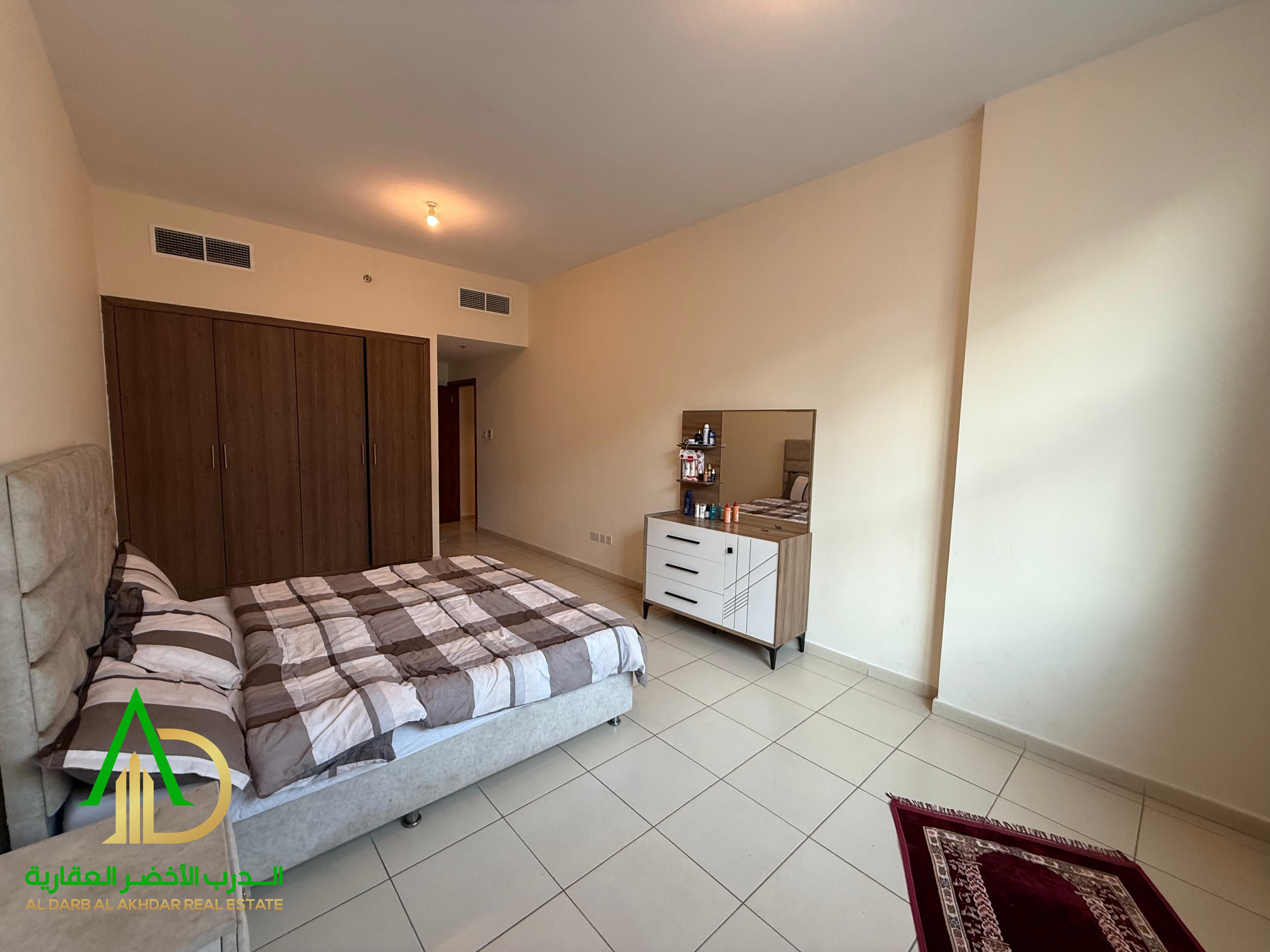 Apartment for sale with two bedrooms and a living room in Ajman, in the Al Rashidiya 3 area, on Sheikh Khalifa Bin Zayed Street, in Ajman One Towers.