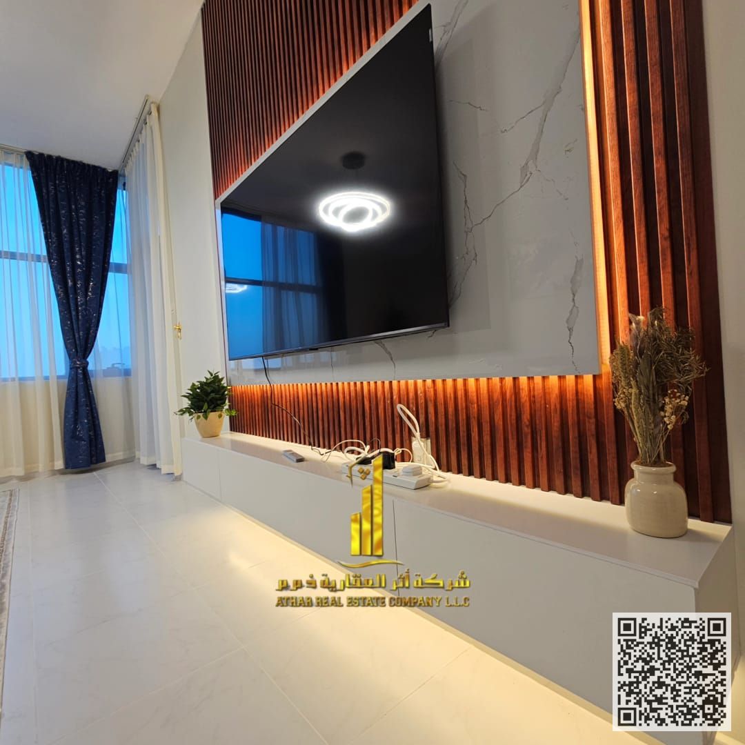 First occupancy, luxurious and elegant two-bedroom apartment with a fully furnished VIP-style living room, available for monthly rent in Ajman Cornich
