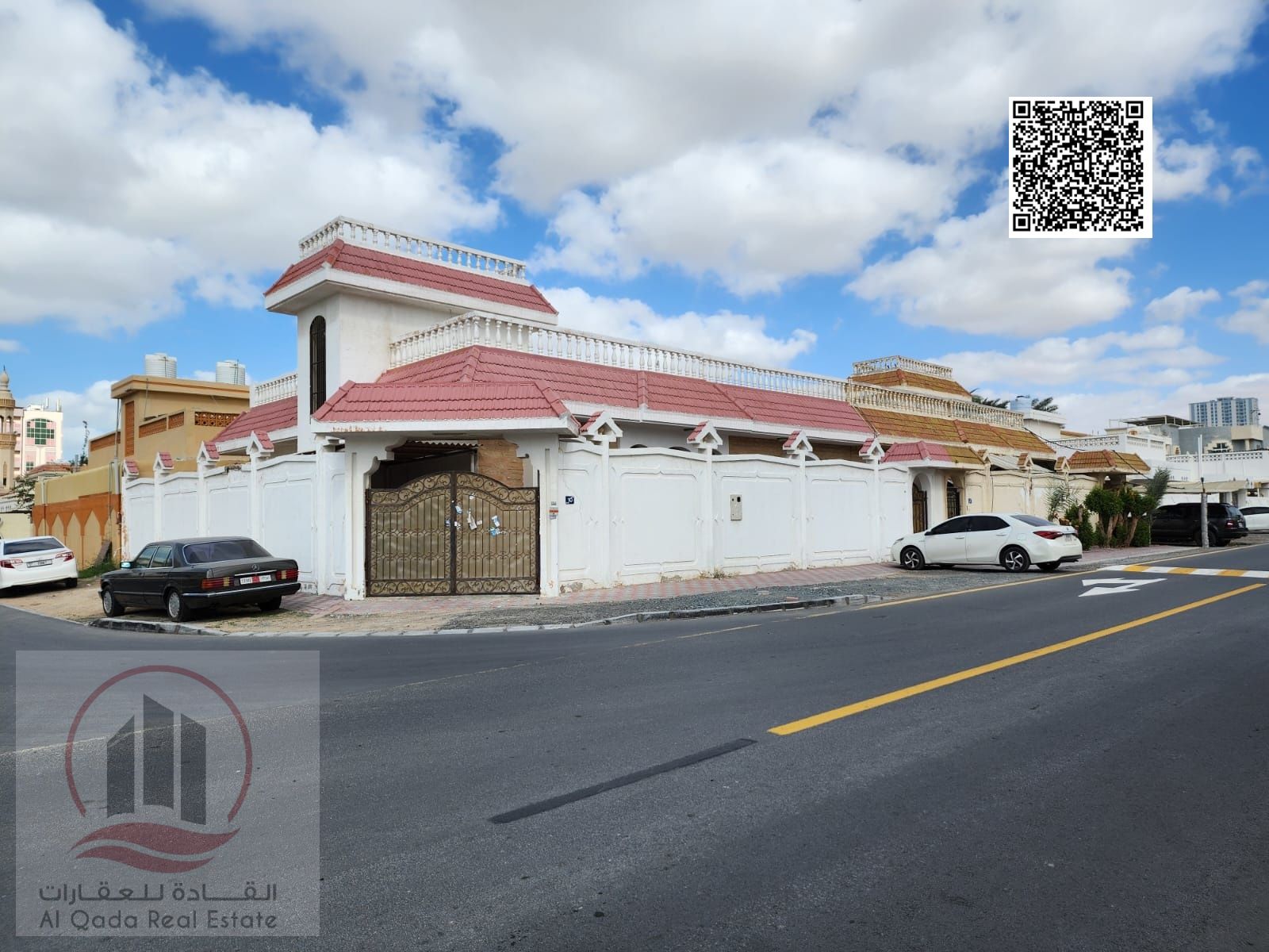 Corner villa for sale in Al Rawda 3, Ajman, including electricity, water, and air conditioning. The villa has a total area of 7,200 sq ft (6 master